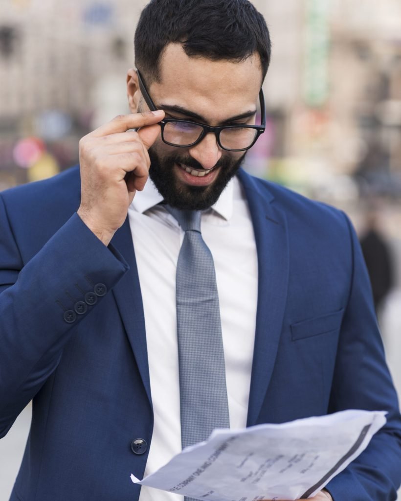 business-man-reading-newspaper